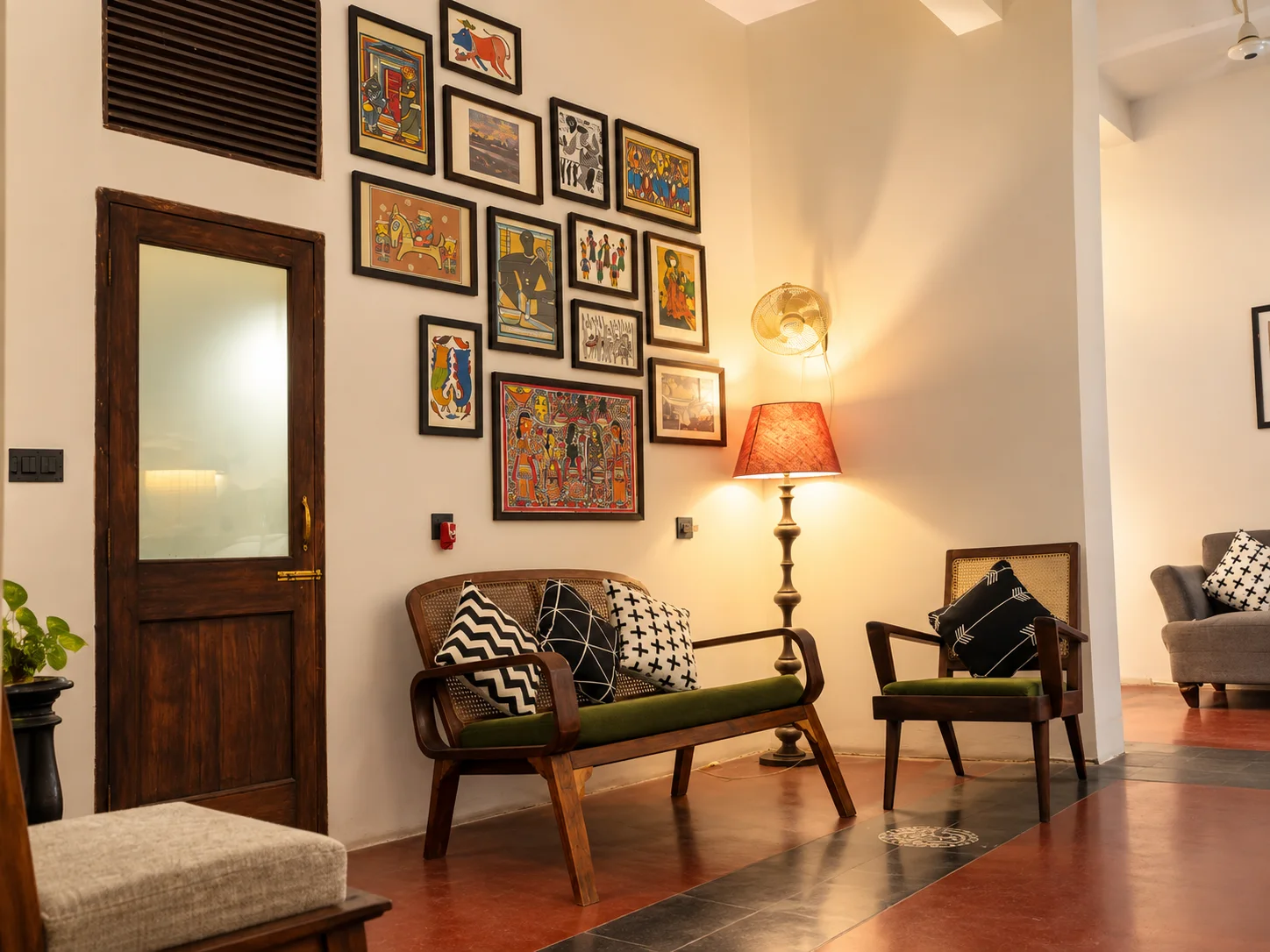 Art-filled shared lounge at The Turquoise Letterbox